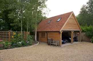 Garage with gable entrance and room above